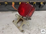 1973 Honda SL350 Motosport Rear Back Tail Light Mount Bracket G15-0773.ADY. Fixed Price $90.00.
