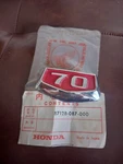 Honda 1969-70 CL70 KO-K1 Scrambler Emblem Side Cover Genuine Nos 87128-087-000. Fixed Price $69.99.